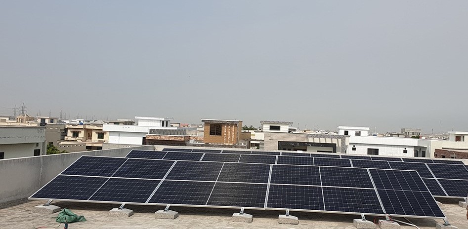 10kW solar system installed on rooftop in Lahore, Pakistan, showing solar panels